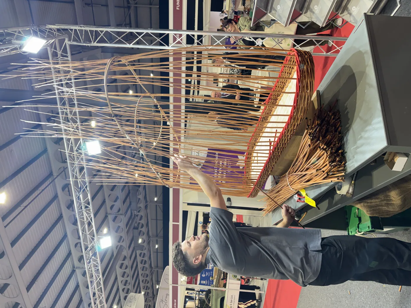 Wicker coffin being hand-woven at National Funeral Exhibition - funeral options