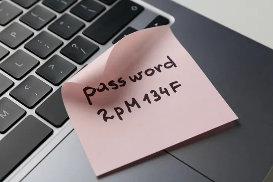 Password written on sticky note next to laptop - why you need a digital legacy plan